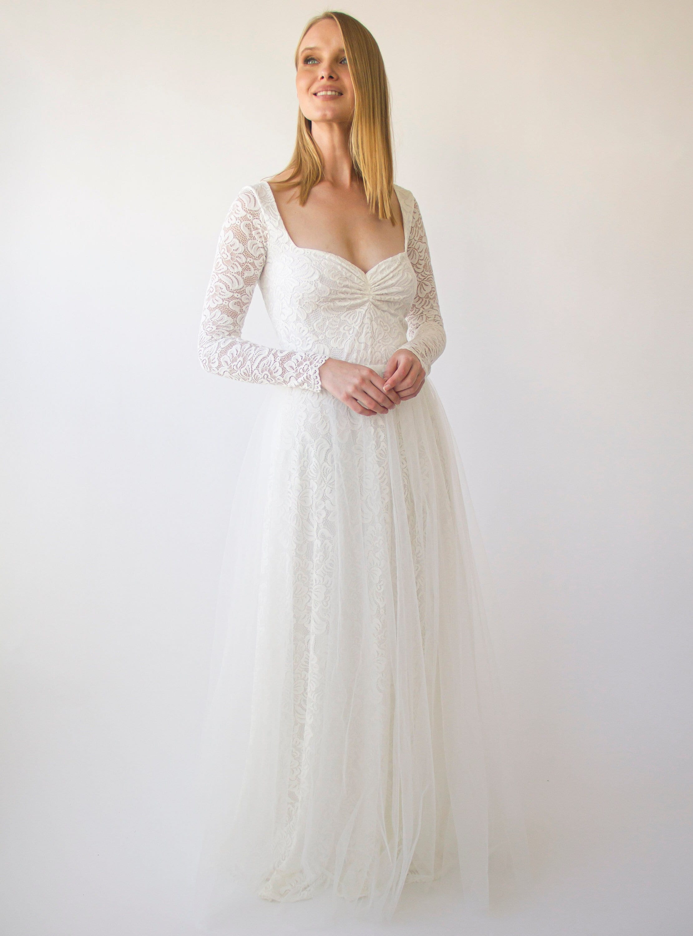 https://blushfashion.boutique/cdn/shop/files/blushfashion-maxi-custom-order-long-sleeves-sweetheart-neckline-ivory-wedding-dress-sheer-illusion-tulle-skirt-on-lace-1408-31322290782323.jpg?v=1701806876